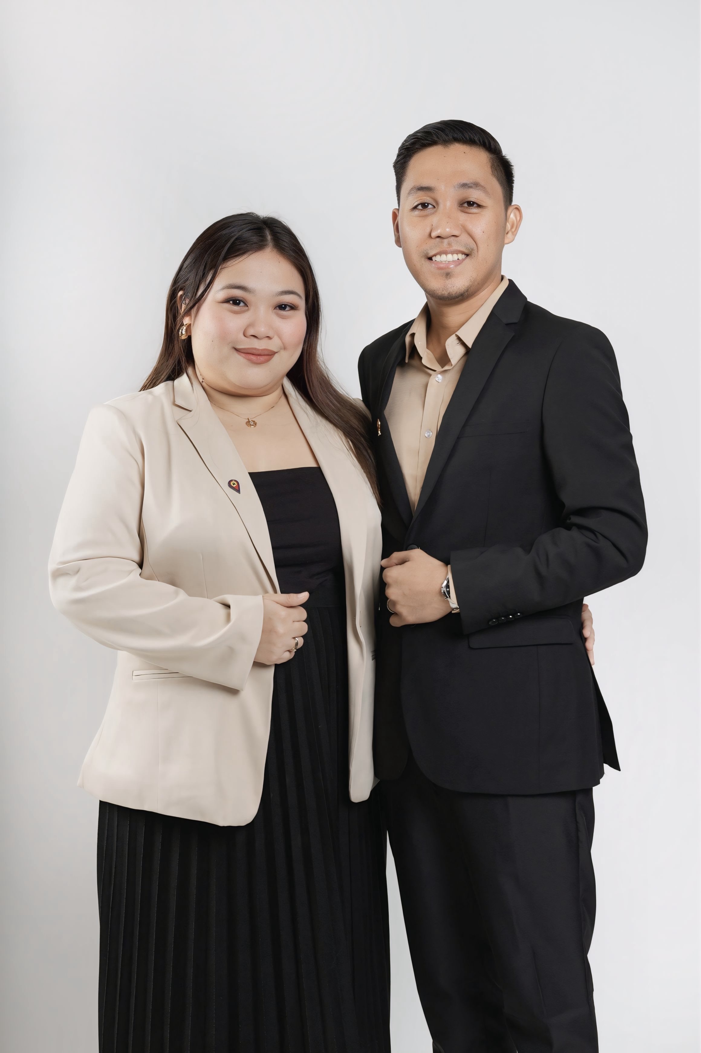 Jessica Mae Abong on the left and Jessiecarl Abong on the right, real estate salespersons